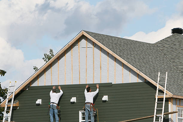 Professional Siding technician working in Georgetown, TX